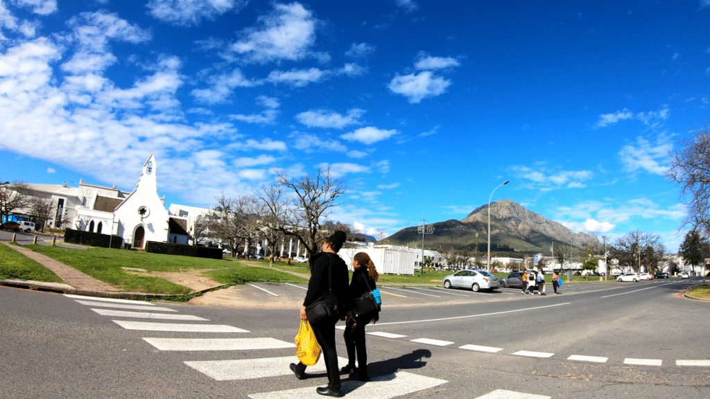 People walking in Stellenbosch Central Close to Park